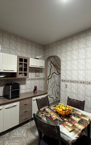 Casa à venda com 96m², 4 quartos e 2 vagas Casa à venda com 96m², 4 quartos e 2 vagasCozinha
