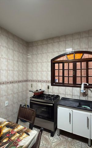 Casa à venda com 96m², 4 quartos e 2 vagas Casa à venda com 96m², 4 quartos e 2 vagasCozinha