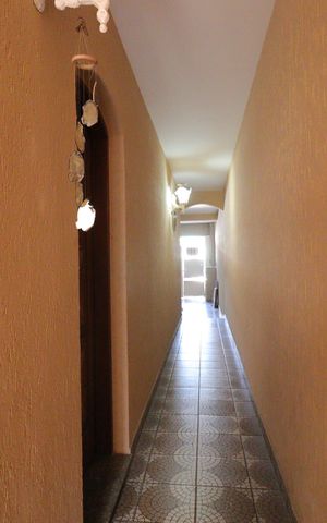 Casa à venda com 282m², 5 quartos e 2 vagasCorredor Externo