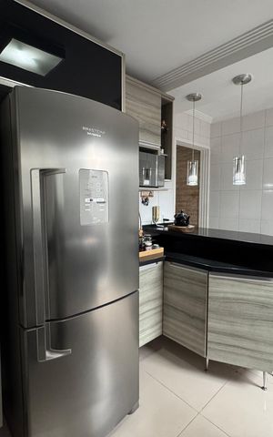 Casa de condomínio à venda com 65m², 2 quartos e 2 vagasCozinha