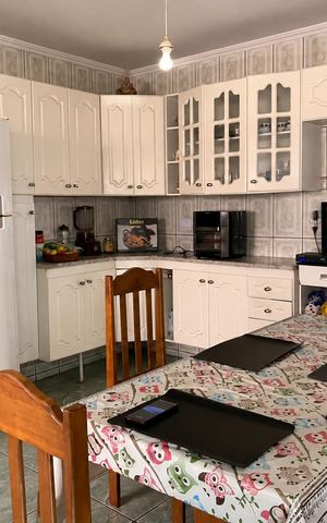 Casa à venda com 280m², 4 quartos e 2 vagas Casa à venda com 280m², 4 quartos e 2 vagasCozinha