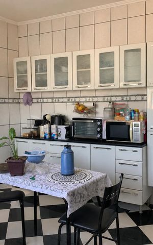 Casa à venda com 280m², 4 quartos e 2 vagas Casa à venda com 280m², 4 quartos e 2 vagasCozinha