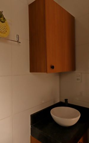 Casa de condomínio à venda com 78m², 2 quartos e 2 vagasBanheiro da Suíte 1