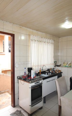 Casa à venda com 184m², 3 quartos e 3 vagasCasa 1 - Cozinha