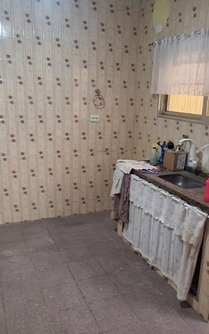 Casa à venda com 79m², 2 quartos e 2 vagas Casa à venda com 79m², 2 quartos e 2 vagasCozinha