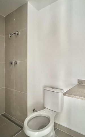 Apartamento à venda com 65m², 2 quartos e 1 vagaBanheiro Corredor