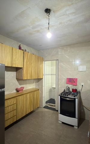 Casa à venda com 65m², 4 quartos e sem vaga Casa à venda com 65m², 4 quartos e sem vagaCozinha