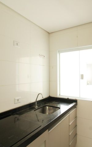 Apartamento à venda com 51m², 3 quartos e 1 vaga Apartamento à venda com 51m², 3 quartos e 1 vagaCozinha e Área de Serviço