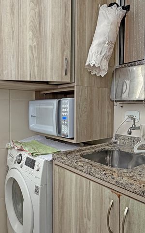 Apartamento para alugar com 69m², 2 quartos e 1 vagaCozinha e Área de Serviço
