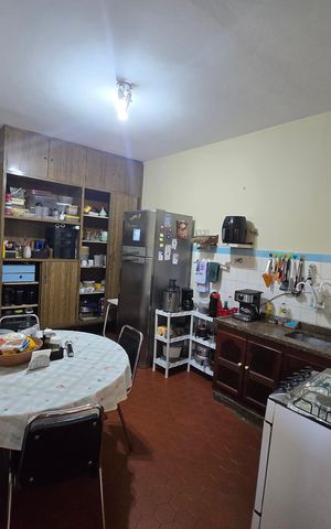 Casa à venda com 215m², 3 quartos e 2 vagas Casa à venda com 215m², 3 quartos e 2 vagasCozinha