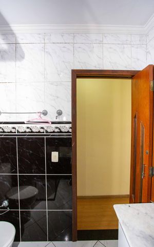 Casa à venda com 250m², 6 quartos e 2 vagasBanheiro da Suíte 1