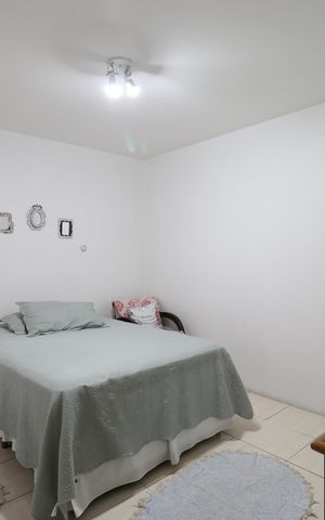 Casa à venda com 98m², 2 quartos e 2 vagasQuarto 1