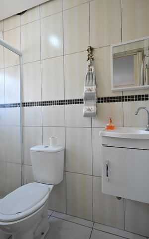 Casa à venda com 59m², 3 quartos e 2 vagasBanheiro Suíte 