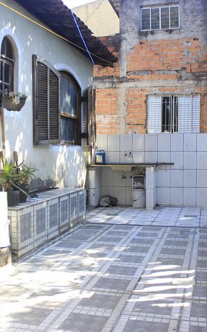 Casa à venda com 352m², 9 quartos e 5 vagasQuintal 2 e corredor (casa 3)