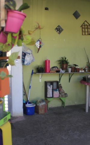 Casa à venda com 352m², 9 quartos e 5 vagasQuintal e garagem (casa 1)