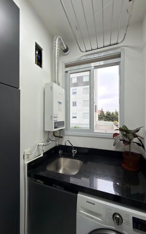 Apartamento à venda com 50m², 2 quartos e 1 vaga Apartamento à venda com 50m², 2 quartos e 1 vagaCozinha e Área de Serviço