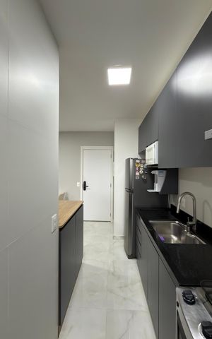 Apartamento à venda com 50m², 2 quartos e 1 vaga Apartamento à venda com 50m², 2 quartos e 1 vagaCozinha e Área de Serviço