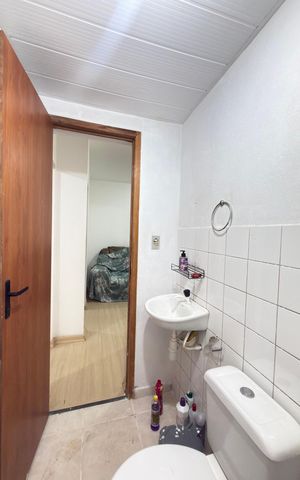 Casa de condomínio para alugar com 80m², 2 quartos e 1 vagaBanheiro social