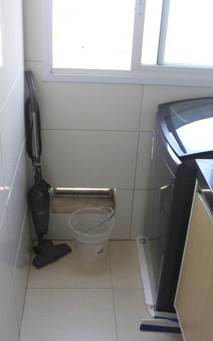 Apartamento à venda com 62m², 2 quartos e 1 vagaCozinha com área de serviço