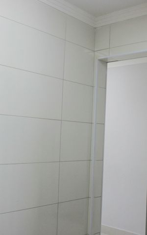 Apartamento à venda com 62m², 2 quartos e 1 vagaCozinha com área de serviço