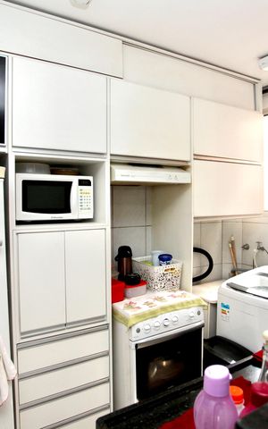 Apartamento para alugar com 52m², 2 quartos e 1 vaga Apartamento para alugar com 52m², 2 quartos e 1 vagaCozinha e Área de Serviço