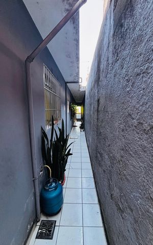Casa à venda com 156m², 2 quartos e 2 vagas Casa à venda com 156m², 2 quartos e 2 vagasCorredor
