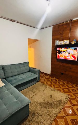 Casa à venda com 156m², 2 quartos e 2 vagas Casa à venda com 156m², 2 quartos e 2 vagasSala