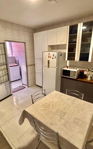 Casa à venda com 156m², 2 quartos e 2 vagas Casa à venda com 156m², 2 quartos e 2 vagasCozinha