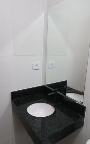 Casa à venda com 119m², 3 quartos e 2 vagasBanheiro da Suíte