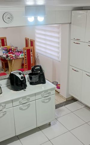 Casa à venda com 200m², 2 quartos e 2 vagas Casa à venda com 200m², 2 quartos e 2 vagasCozinha