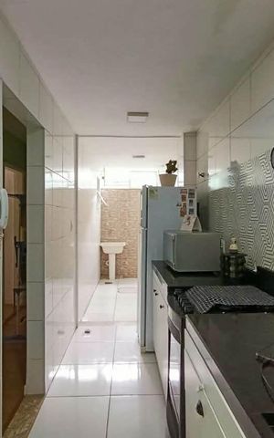 Casa à venda com 50m², 2 quartos e 1 vaga Casa à venda com 50m², 2 quartos e 1 vagaCozinha e Área de Serviço