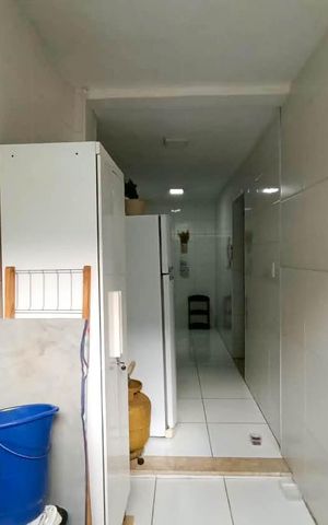 Casa à venda com 50m², 2 quartos e 1 vaga Casa à venda com 50m², 2 quartos e 1 vagaCozinha e Área de Serviço