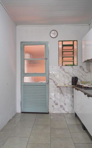 Casa para alugar com 120m², 2 quartos e 2 vagasCozinha