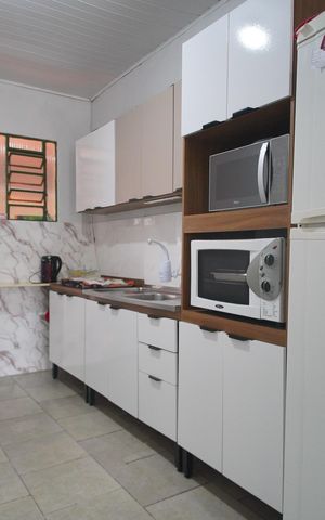Casa para alugar com 120m², 2 quartos e 2 vagasCozinha