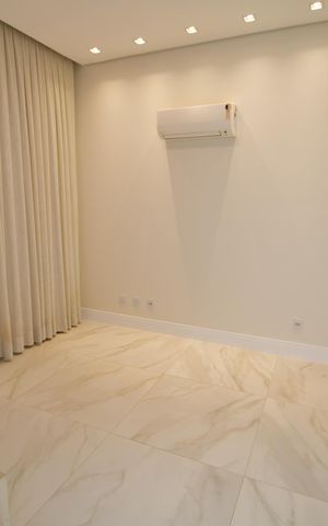 Casa de condomínio à venda com 323m², 4 quartos e 4 vagasSala de TV