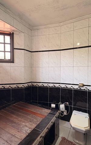 Casa à venda com 303m², 4 quartos e 6 vagasBanheiro da Suíte