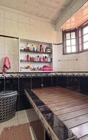 Casa à venda com 303m², 4 quartos e 6 vagasBanheiro da Suíte
