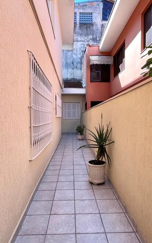 Casa à venda com 125m², 3 quartos e 2 vagas Casa à venda com 125m², 3 quartos e 2 vagasÁrea externa