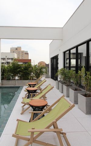 Studio à venda com 26m², 1 quarto e sem vaga Studio à venda com 26m², 1 quarto e sem vagaÁrea comum - Piscina