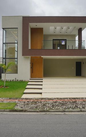 Casa de condomínio para alugar com 258m², 3 quartos e 4 vagas Casa de condomínio para alugar com 258m², 3 quartos e 4 vagasFachada