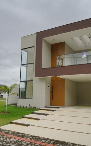 Casa de condomínio para alugar com 258m², 3 quartos e 4 vagas Casa de condomínio para alugar com 258m², 3 quartos e 4 vagasFachada