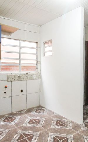 Casa à venda com 106m², 2 quartos e 2 vagas Casa à venda com 106m², 2 quartos e 2 vagasCozinha