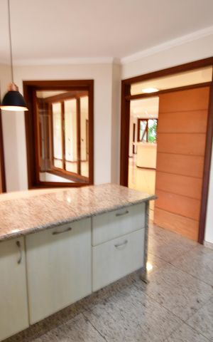 Casa de condomínio para alugar com 470m², 4 quartos e 4 vagasCozinha
