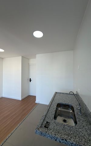 Apartamento à venda com 61m², 2 quartos e 1 vaga Apartamento à venda com 61m², 2 quartos e 1 vagaCozinha e Área de Serviço