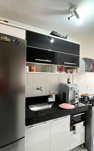 Apartamento à venda com 51m², 2 quartos e 1 vaga Apartamento à venda com 51m², 2 quartos e 1 vagaCozinha e Área de Serviço