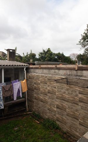 Casa à venda com 145m², 2 quartos e 2 vagasQuintal