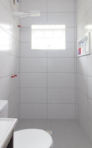 Casa à venda com 145m², 2 quartos e 2 vagasBanheiro do Quarto 1