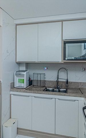 Casa à venda com 93m², 2 quartos e 2 vagas Casa à venda com 93m², 2 quartos e 2 vagasCozinha