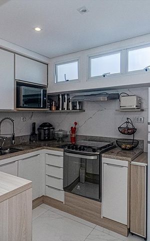 Casa à venda com 93m², 2 quartos e 2 vagas Casa à venda com 93m², 2 quartos e 2 vagasCozinha