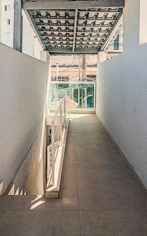 Casa à venda com 93m², 2 quartos e 2 vagas Casa à venda com 93m², 2 quartos e 2 vagasÁrea externa